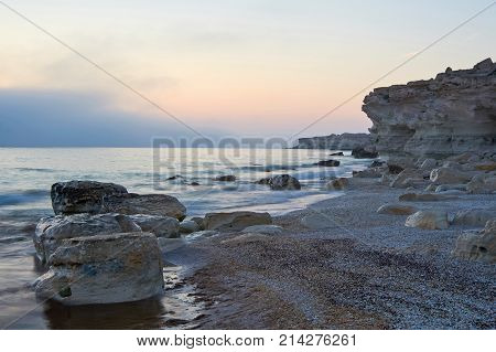 On the shore of the Caspian Sea. Caspian Sea in Kazakhstan.
The Caspian Sea is the largest enclosed inland body of water on Earth by area, variously classed as the world's largest lake or a full-fledged sea.