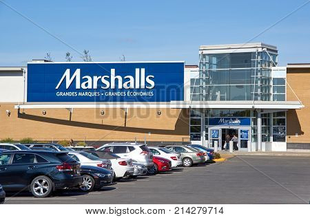 MONTREAL CANADA - NOVEMBER 7 2017: Marshals store and walking people. Marshalls is a chain of American and Canadian off-price department stores owned by TJX Companies.