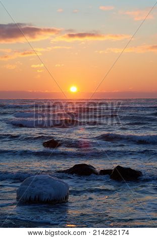 On the shore of the Caspian Sea. Caspian Sea in Kazakhstan.
The Caspian Sea is the largest enclosed inland body of water on Earth by area, variously classed as the world's largest lake or a full-fledged sea.