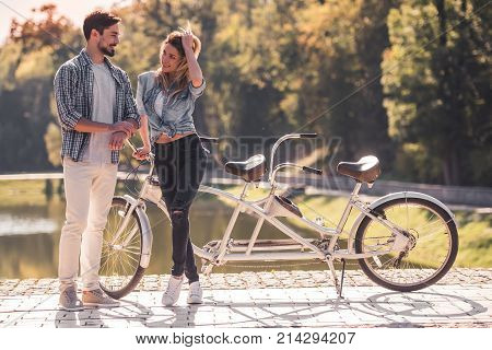 Couple With A Tandem Bicycle