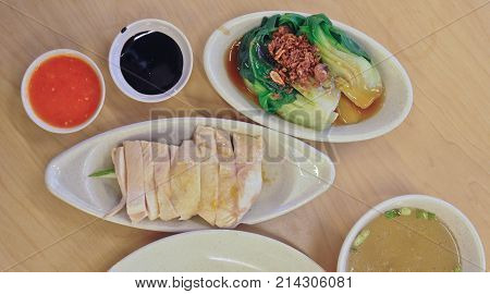Delicious legendary Singaporean Hainanese chicken rice full course