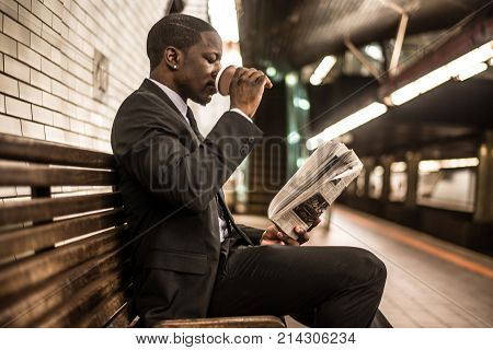 Businessman in full suit in New York subway metro