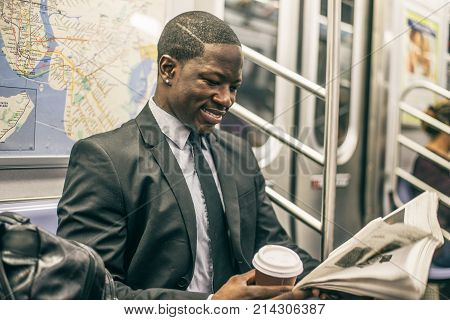 Businessman in full suit in New York subway metro