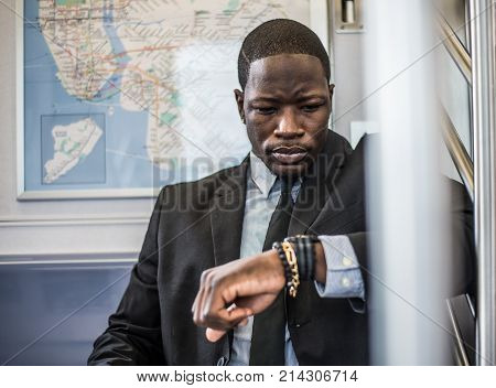 Businessman in full suit in New York subway metro