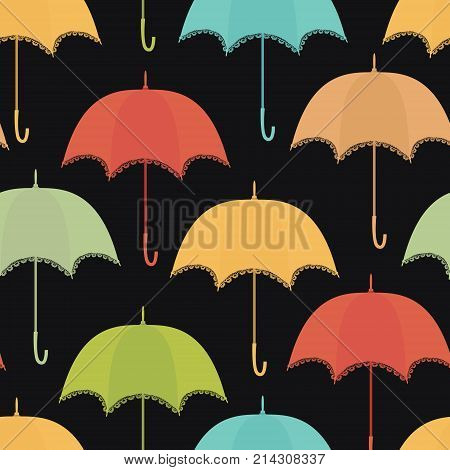 Lace colorful umbrella on the dark background