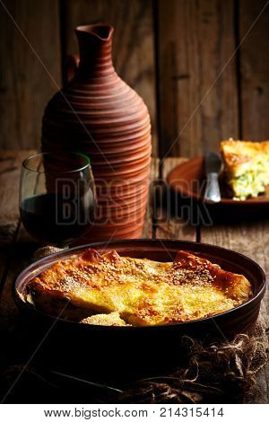 Cheese cake achma traditional Georgian pie . style rustic. selective focus