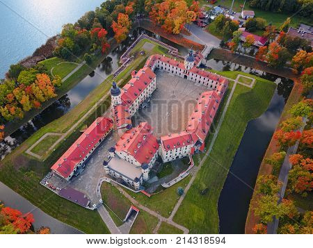 Nesvizh Castle Belarus Europe. Aerial view of famous belarusian medieval castle. Historic building in autumn. Symbol of belorussian architecture. Cityscape of Nesvizh. Birds eye panorama