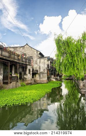 The Chinese architecture and buildings lining the water canals to Xitang town in Zhejiang Province China.