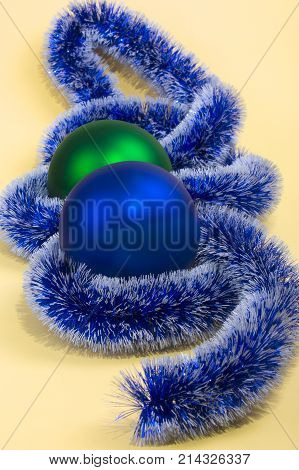 Christmas toys and decorations on a yellow background