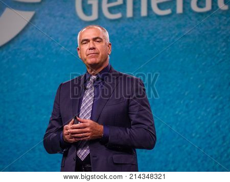 BERLIN GERMANY - NOV 13 2017: NetApp vice president of Worldwide Field and Customer Operations Henri Richard makes speech at NetApp Insight 2017 conference in Berlin Germany on Nov 13 2017.
