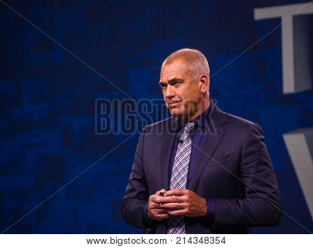 BERLIN GERMANY - NOV 13 2017: NetApp vice president of Worldwide Field and Customer Operations Henri Richard makes speech at NetApp Insight 2017 conference in Berlin Germany on Nov 13 2017.