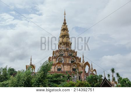 White big buddha aerial view with mountain background at Wat Prathat Phasornkaew Khao Kho Phetchabun Thailand