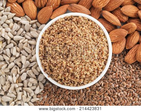 Homemade LSA mix in plate - Linseed or flax seeds, Sunflower seeds and Almonds. Traditional Australian blend of ground, source of dietary fiber, protein, omega fatty acids.Copy space for text.Top view