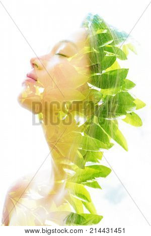 Bright aspects of nature are highlighted along with her peaceful and relaxed expression