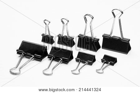 binder clips isolated on white background paper accessory black business