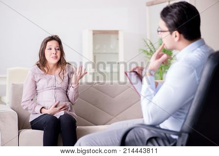 Pregnant woman visiting psychologist doctor