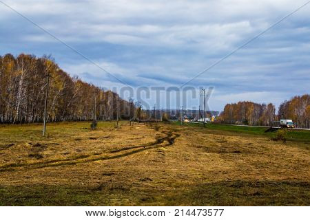 Autumn road home suitcase travel the road in the evening