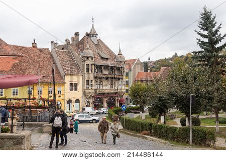 Sighisoara Romania October 08 2017 : Fragment of Hermann Oberth square near to the entrance to the old town in Sighisoara city in Romania