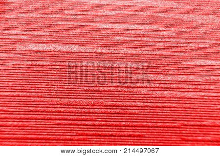 close up red corrugated paper background pattern