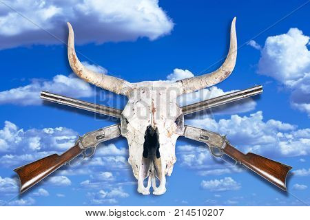 Antique cowboy lever action rifle and cow skull .