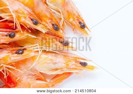 Cooked shrimps on white background closeup head