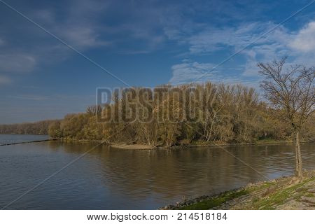 Confluence of Dunaj and Morava rivers in sunny autumn morning