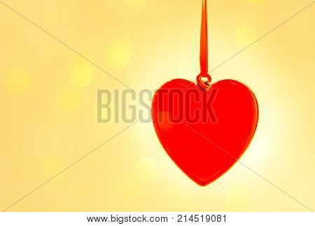Valentines day greeting card. Red heart on the lights background.