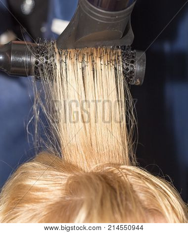 hair styling in the salon . Photos in the studio