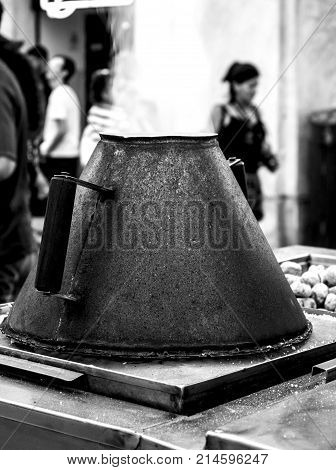 Typical street food roasted chestnuts in lisbon