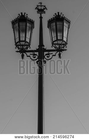 Black and white photo of Portuguese lamp post in gothic style