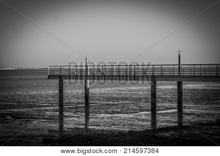 The bridge of melancholy. Photo taken during a low oceanic tide