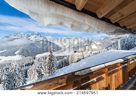 View from terrace of wooden hut on mountain in skiresort Werfenweng to Tennen mountains in Salzburg Austria