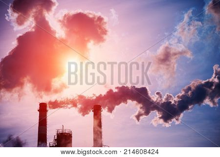 Smoking chimneys of a coal fired power plant. Global warming. The problem of ecology.