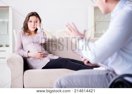 Pregnant woman visiting psychologist doctor