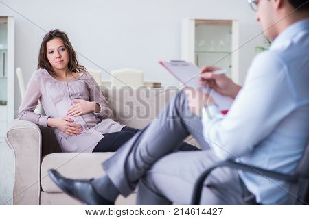 Pregnant woman visiting psychologist doctor