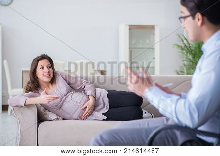 Pregnant woman visiting psychologist doctor