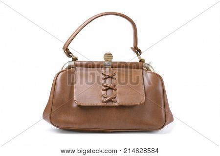 an old brown leatherette purse on a white background