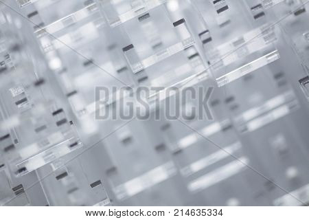 Abstract high-tech background. Details of transparent plastic or glass. Laser cutting of plexiglass.
