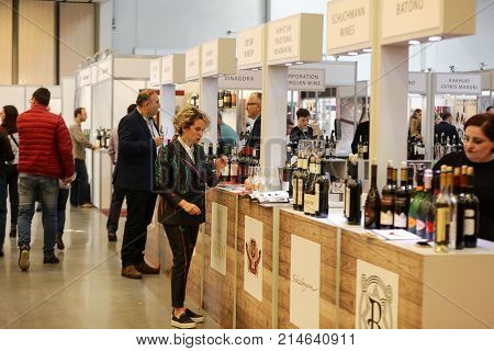 CRACOW POLAND - NOVEMBER 16 2017: International Wine Trade Fair ENOEXPO in Cracow. Producers of wine from all around the world meet the importers distributors and representatives. Cracow. Poland