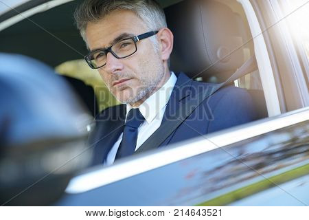  Private taxi driver driving fancy car                             