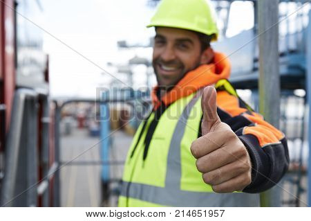 Happy Thumbs up docker smiling to camera