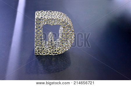 Abstract object of a gray color printed on a 3d printer on black dark surface. Fused deposition modeling, FDM. Progressive modern additive technology. Concept of 4.0 industrial revolution