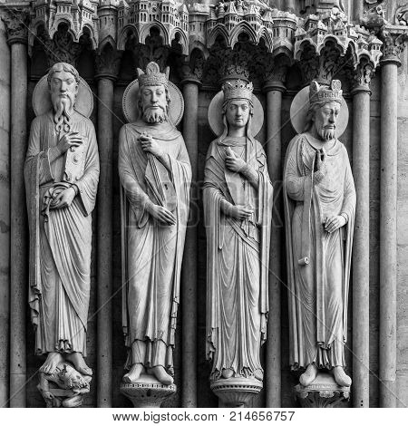 Architectural details of the catholic cathedral Notre-Dame de Paris. Built in French Gothic architecture Notre-Dame's facade showing details of the Portal of St.Anne. Paris France