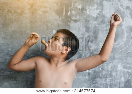 Portrait Asian fat boy concept healthy and lose weight selective and soft focus