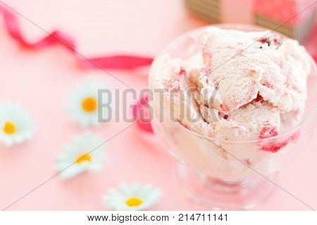 ice cream in a Cup next to the marshmallows flowers pink sweets