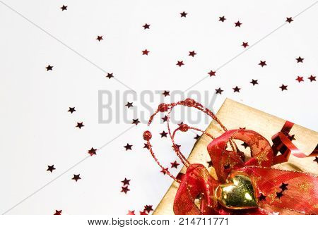 Holidays background with luxury wrapping present in red colour