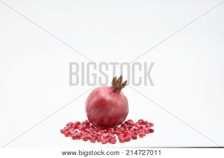 Pomegranate On A White Background.natural.for Isolation.