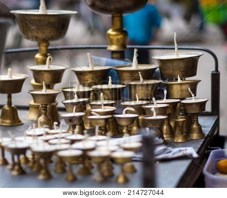 Candle holders made of brass on sale on the street market