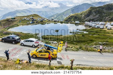 Col de la Croix de Fer France - 25 July 2015: BIC caravan driving on the road to the Col de la Croix de Fer in Alps during the stage 20 of Le Tour de France 2015. BIC is a global company which offers an extensive line of writing and office tools.
