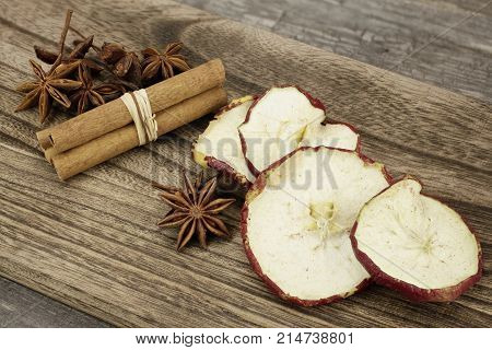 Christmas decoration with star anise, cinnamon sticks and dried apple slices